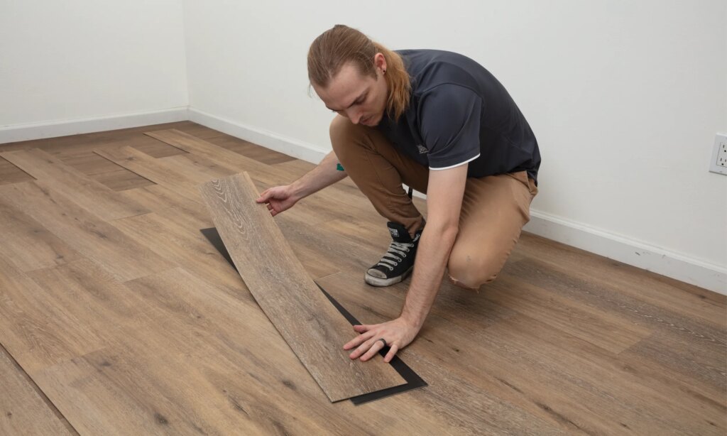Chris positioning a plank on top of an upside-down plank to photograph both sides.
