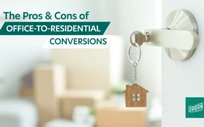 An image promoting the pros and cons of office-to-residential conversions, featuring a close-up of a door with a key and house-shaped keychain, indicating the transformation from office spaces to residential homes.